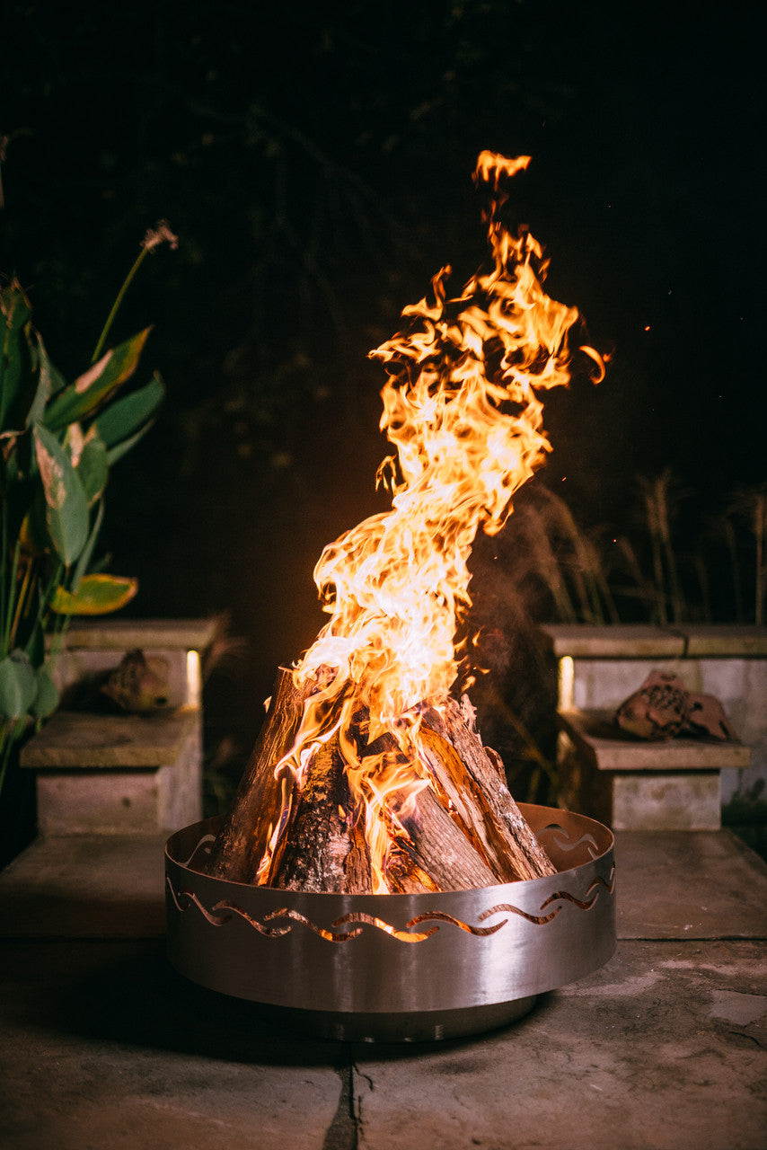 Breathtaking artist designed fire pit bowl for outdoor gatherings around the wood burning fires