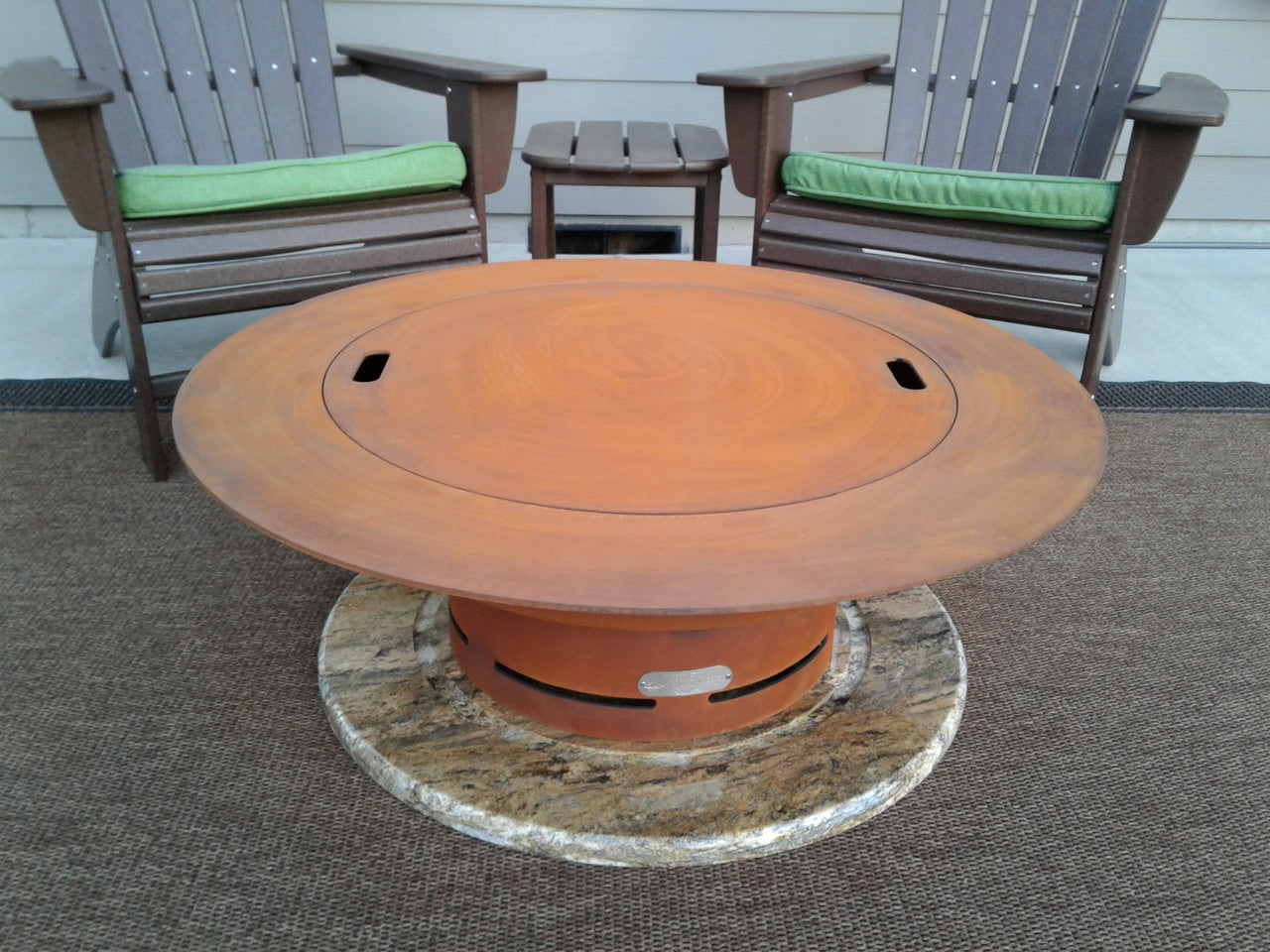 Round metal fire pit table with lid for outdoor entertaining