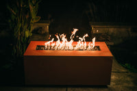 Linear Fire Pit with flames glowing brightly in the dark for evenings of stimulating conversation