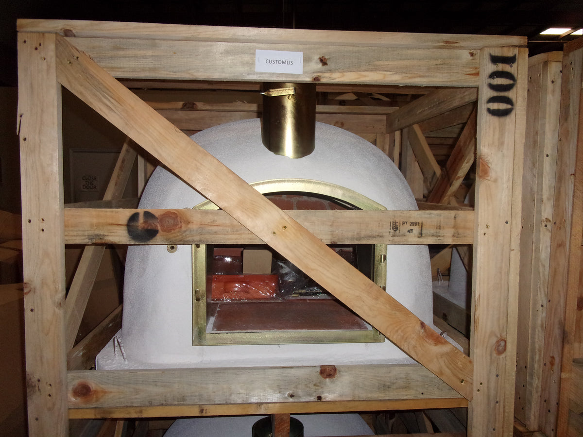 A white dome-shaped pizza oven or wood-fired oven that is ready for custom builders designs