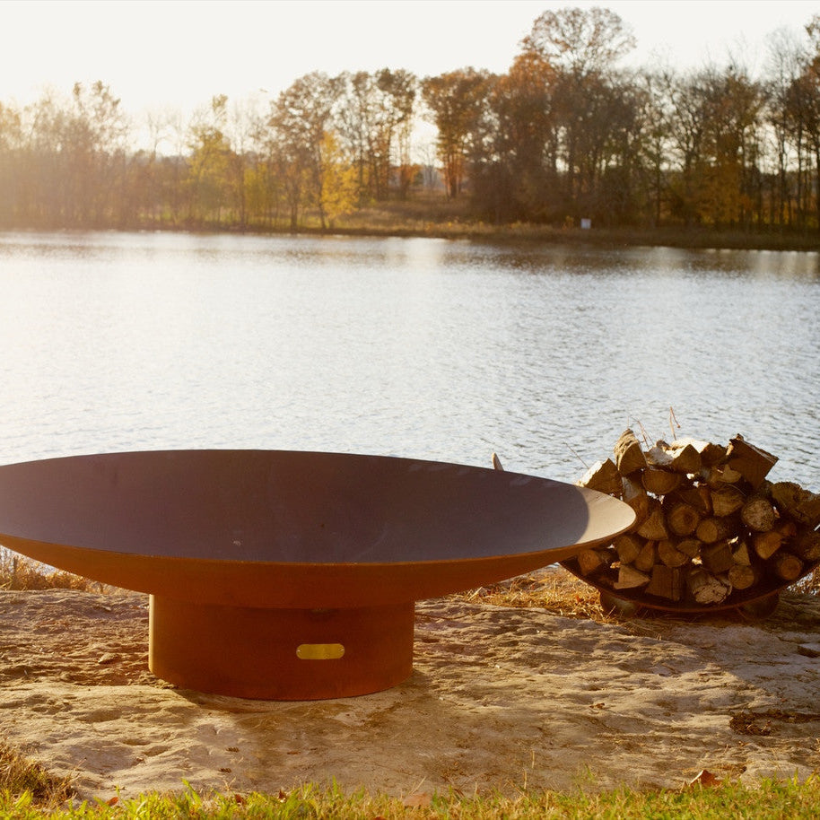 Breathtaking artist designed unique fire pit bowl for outdoor entertaining around the wood burning fires