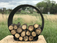 Artistic Black metal firewood holder with logs for wood burning fire pits
