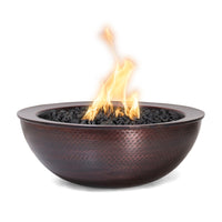 Luxury round fire pit bowl for  an enchanting gathering of friends in high end outdoor backyard